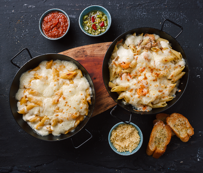 Baked penne pasta with bolognese sauce